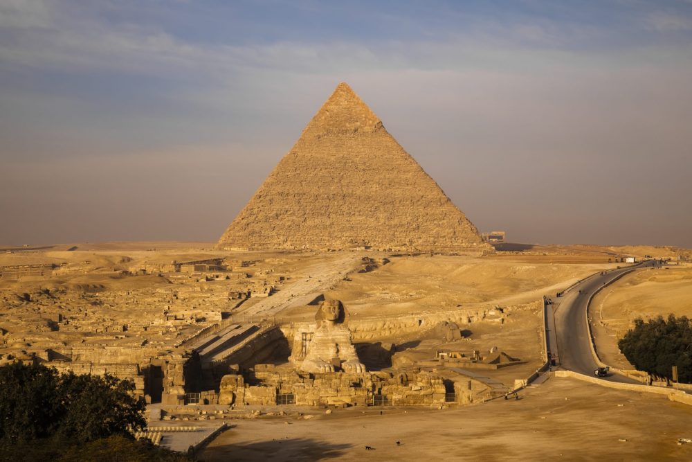 Sunset view of Pyramid complex of Giza, in Cairo, Egypt.